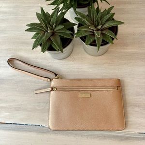 Kate Spade Wristlet Light Pink with Front Zip & Gold Detailing.